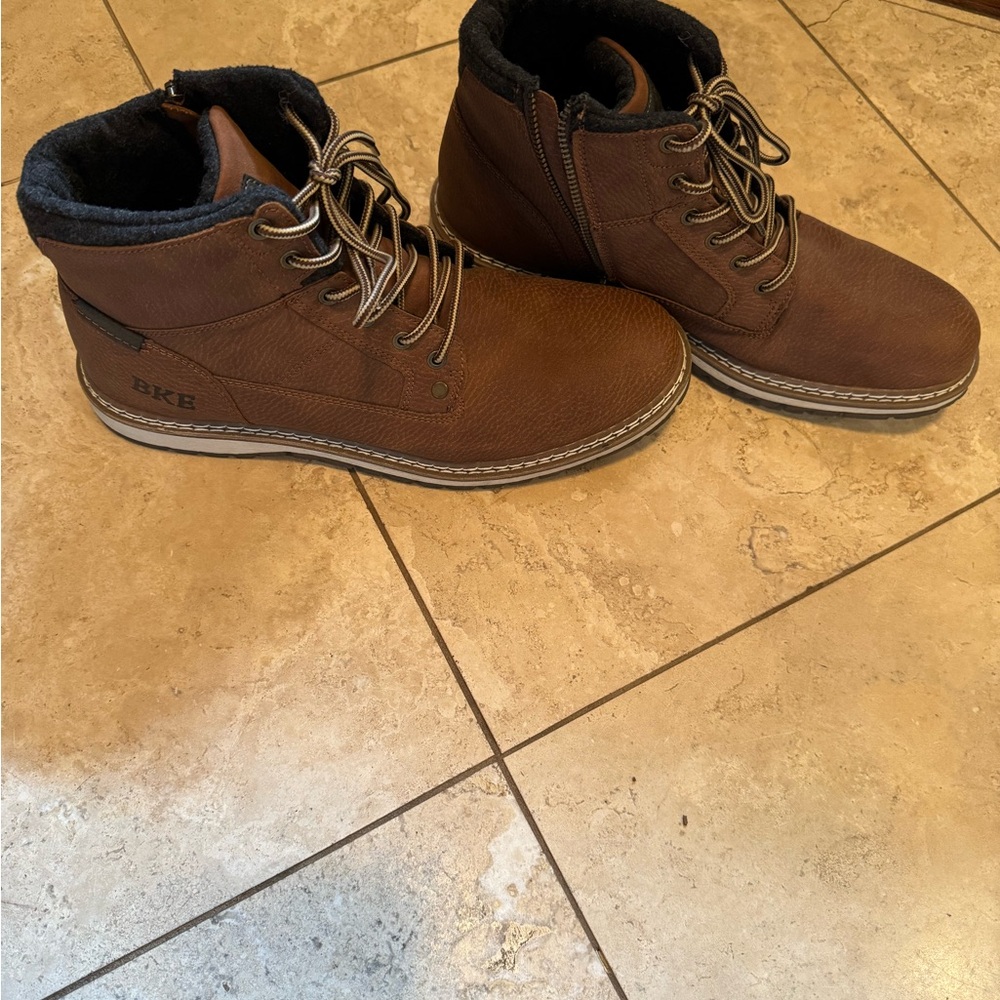 Men’s Buckle Boots with zipper on inside ankle. Worn once. Great condition.